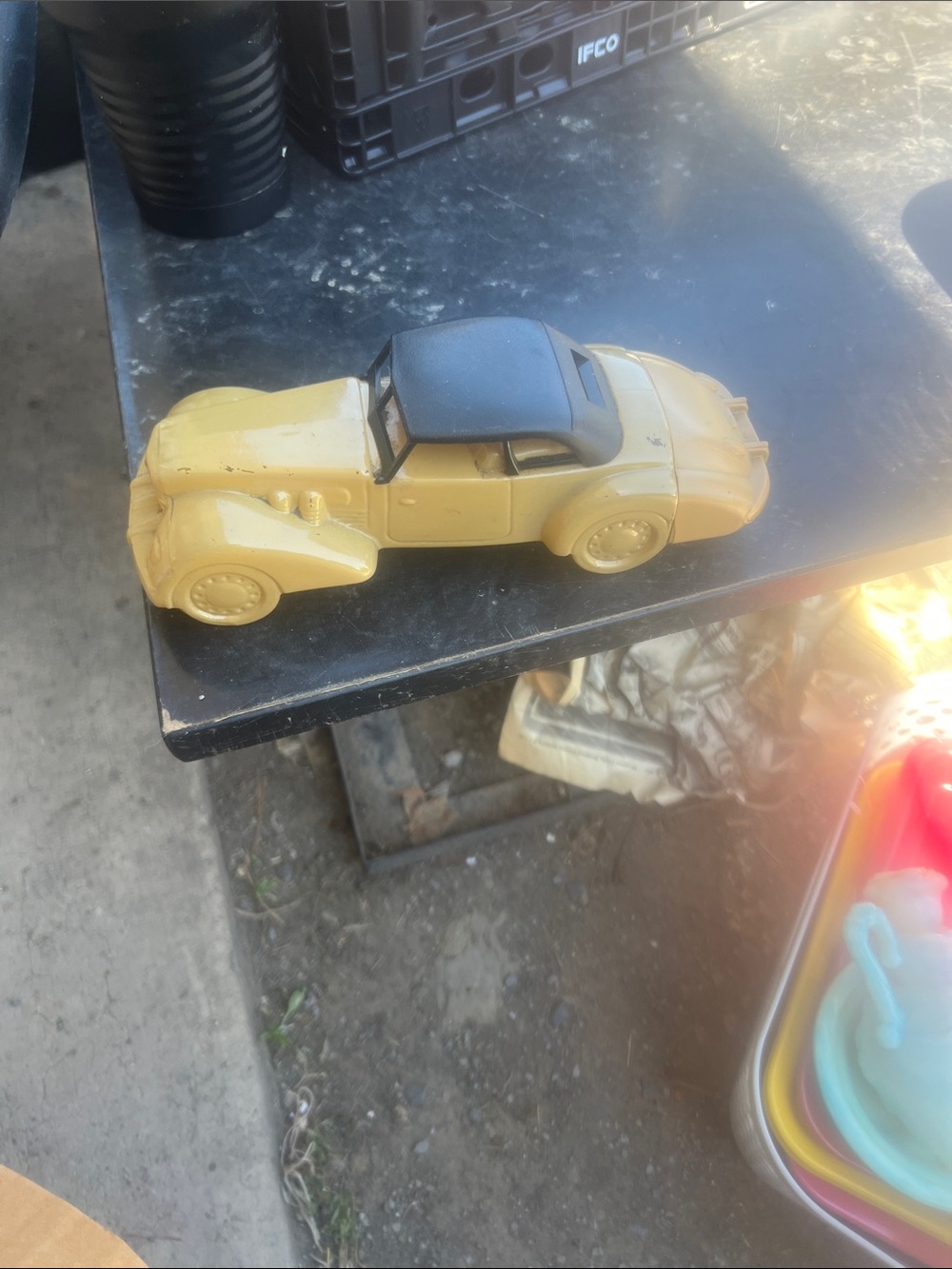 Vintage-Style Yellow and Black Avon decanter.